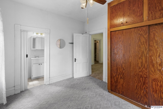 1373 S St, Blair, NE 68008 - unfurnished bedroom with light colored carpet, connected bathroom, and a closet