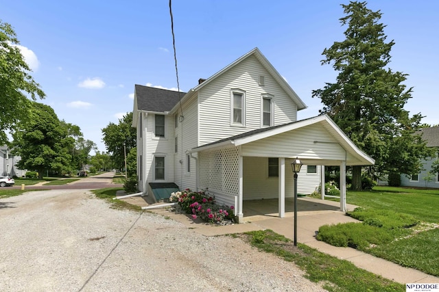 1373 S St, Blair, NE 68008 - view of front facade with a front yard and driveway