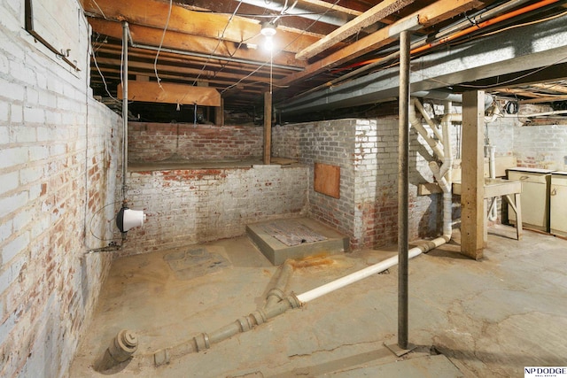 1373 S St, Blair, NE 68008 - unfinished below grade area featuring brick wall