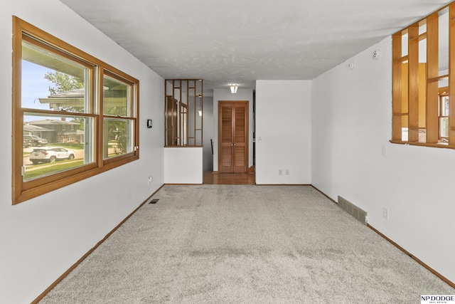 9607 Spencer St, Omaha, NE 68134 - unfurnished room with carpet floors and baseboards