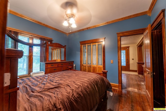 102 Eldon St, Talmage, NE 68448 - bedroom featuring wood finished floors, crown molding, baseboards, and ceiling fan