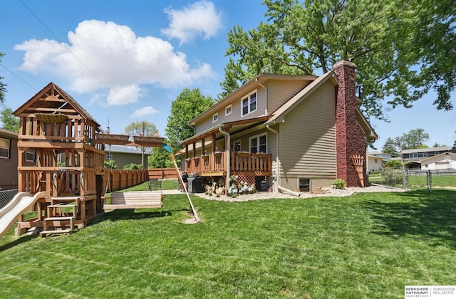 12555 Ohern St, Omaha, NE 68137 - rear view of property featuring a playground and a chimney
