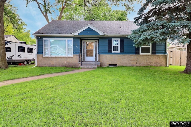 1827 E Broad St, Fremont, NE 68025 - bungalow-style home featuring roof with shingles, entry steps, and stone siding