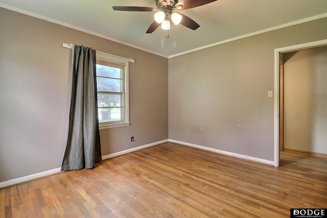1827 E Broad St, Fremont, NE 68025 - spare room featuring baseboards, ceiling fan, light wood-style flooring, and ornamental molding