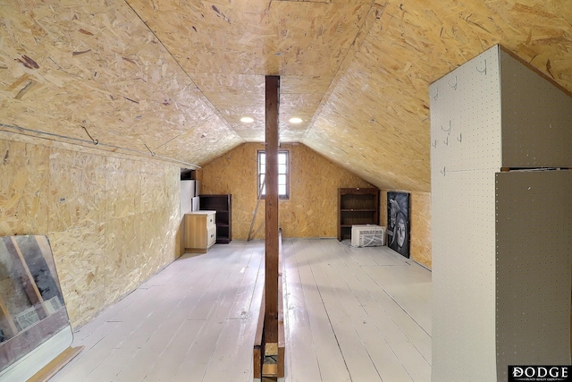 1827 E Broad St, Fremont, NE 68025 - additional living space featuring hardwood / wood-style flooring and vaulted ceiling