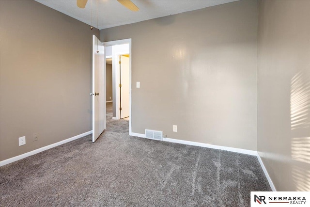 15161 R St, Omaha, NE 68137 - spare room featuring carpet flooring, a ceiling fan, and baseboards