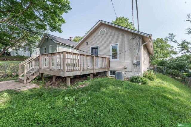 5515 Hickory St, Omaha, NE 68106 - back of house featuring central AC unit and a deck
