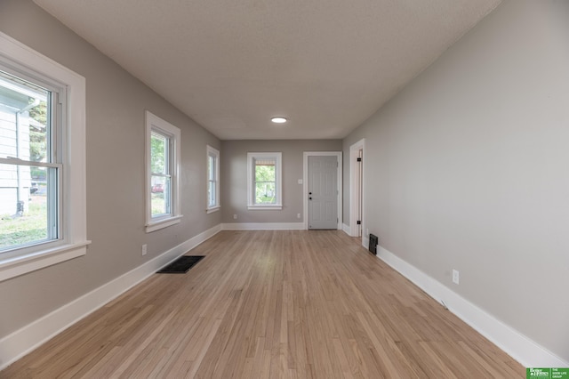 5515 Hickory St, Omaha, NE 68106 - spare room featuring light wood-type flooring and baseboards