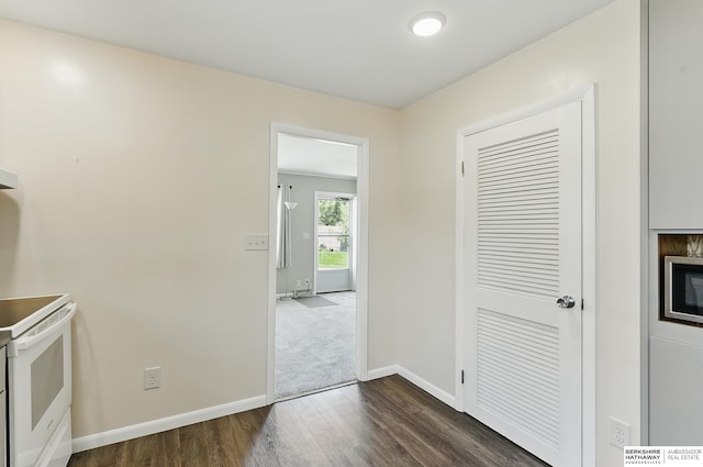 3847 Valley St, Omaha, NE 68105 - corridor featuring dark wood-type flooring and baseboards
