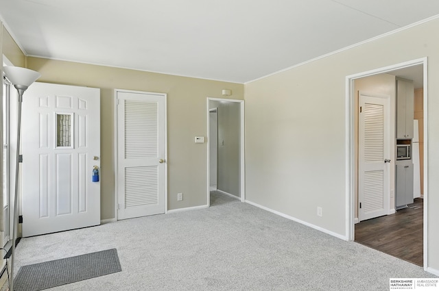 3847 Valley St, Omaha, NE 68105 - unfurnished bedroom featuring carpet flooring and ornamental molding