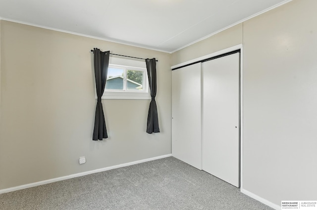3847 Valley St, Omaha, NE 68105 - unfurnished bedroom with carpet, ornamental molding, and a closet