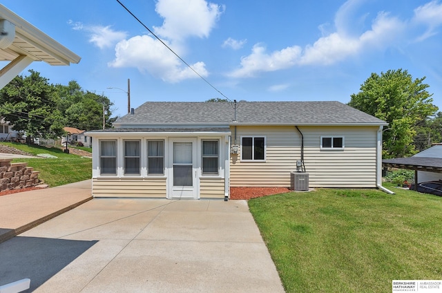 3847 Valley St, Omaha, NE 68105 - back of house with a patio, a yard, and roof with shingles