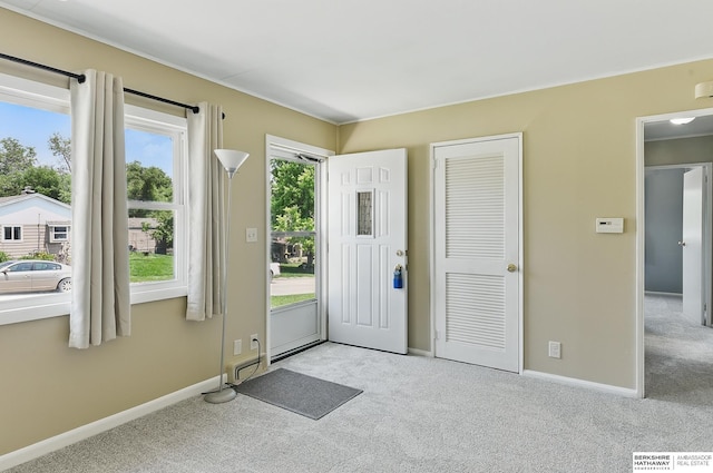 3847 Valley St, Omaha, NE 68105 - carpeted entrance foyer featuring baseboards