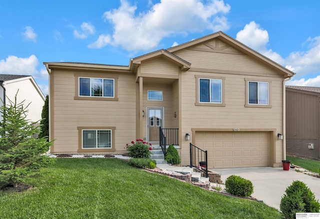 16421 Redman Ave, Omaha, NE 68116 - view of front of property with a garage, concrete driveway, and a front yard