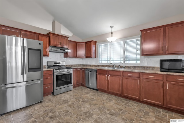 16421 Redman Ave, Omaha, NE 68116 - kitchen featuring appliances with stainless steel finishes, under cabinet range hood, a sink, lofted ceiling, and stone finish floors