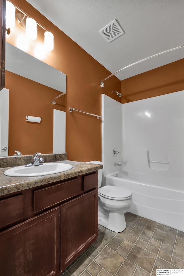 16421 Redman Ave, Omaha, NE 68116 - bathroom with washtub / shower combination, vanity, and toilet