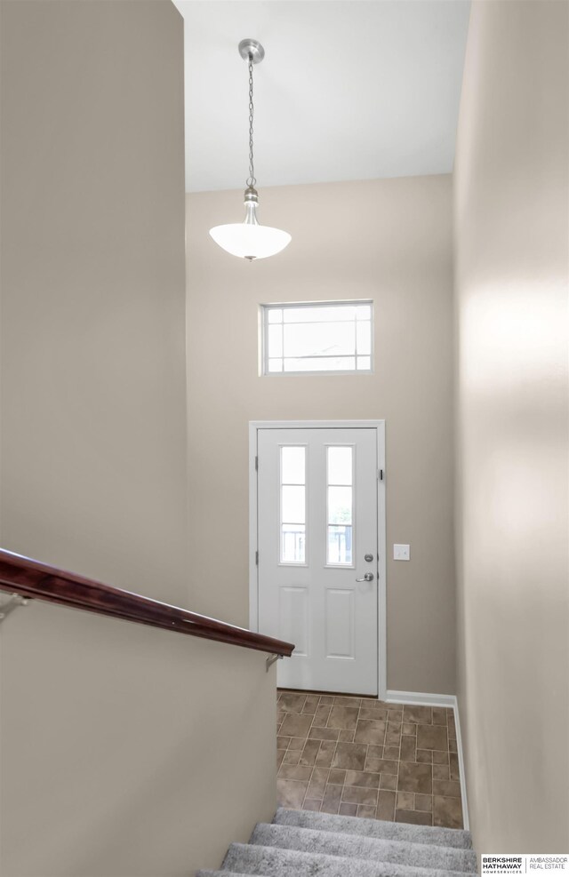 16421 Redman Ave, Omaha, NE 68116 - foyer entrance featuring baseboards and stairs