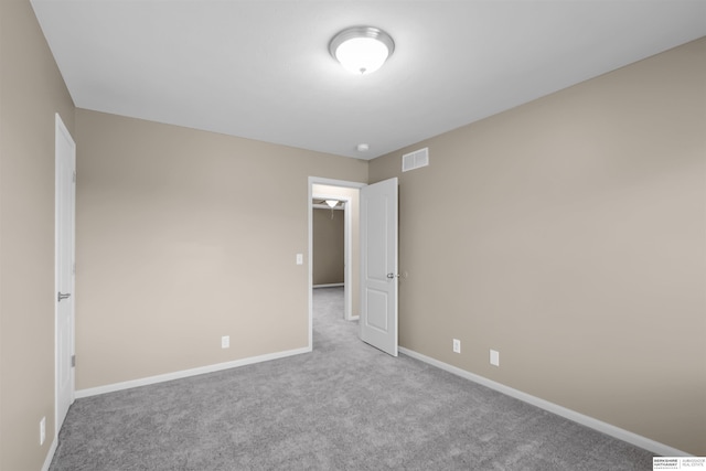 16421 Redman Ave, Omaha, NE 68116 - spare room featuring carpet floors and baseboards