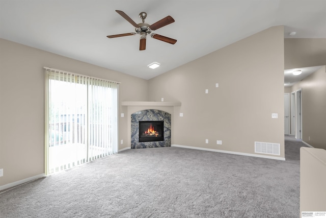 16421 Redman Ave, Omaha, NE 68116 - unfurnished living room featuring vaulted ceiling, a fireplace, carpet floors, ceiling fan, and baseboards