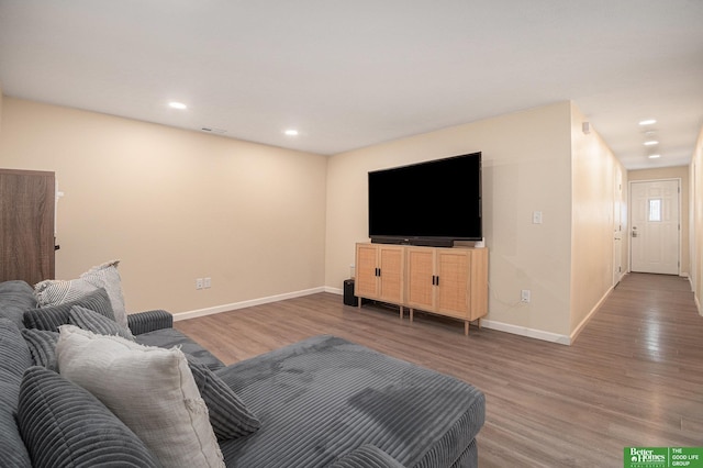 601 5th Ave, Plattsmouth, NE 68048 - living area with baseboards, wood finished floors, and recessed lighting