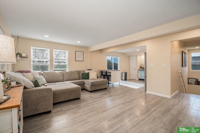 601 5th Ave, Plattsmouth, NE 68048 - living room featuring light wood-style flooring, recessed lighting, and baseboards
