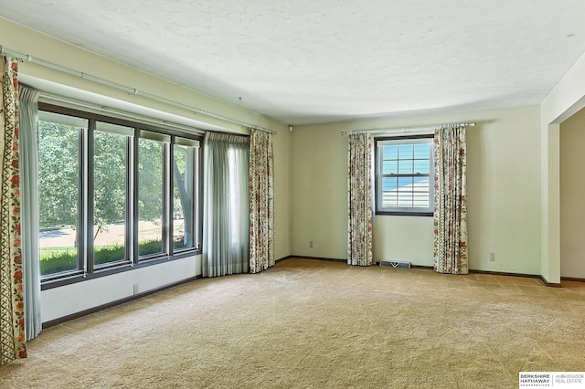 3629 S 114th Ave, Omaha, NE 68144 - empty room featuring carpet floors and baseboards