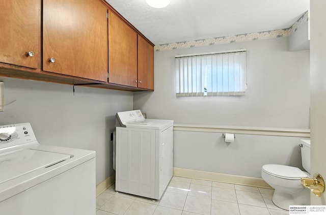 3629 S 114th Ave, Omaha, NE 68144 - laundry room featuring light tile patterned floors and baseboards