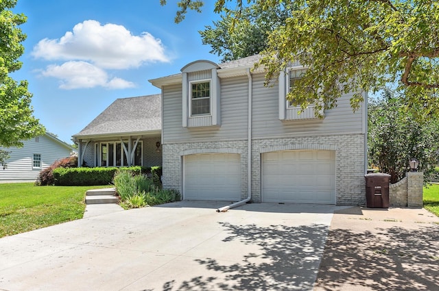 3629 S 114th Ave, Omaha, NE 68144 - view of front of property with concrete driveway, an attached garage, brick siding, a shingled roof, and a front yard