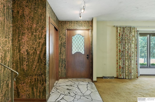3629 S 114th Ave, Omaha, NE 68144 - carpeted entryway with baseboards