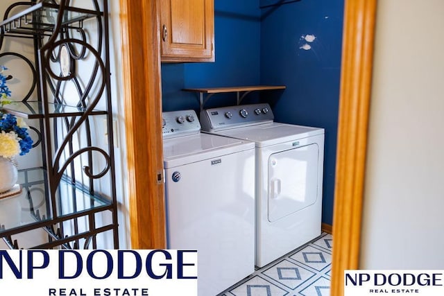 611 Diamond Ln, Papillion, NE 68133 - laundry area with washer and clothes dryer and cabinet space