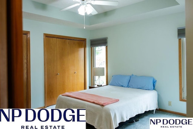611 Diamond Ln, Papillion, NE 68133 - bedroom featuring a closet, carpet, ceiling fan, and baseboards