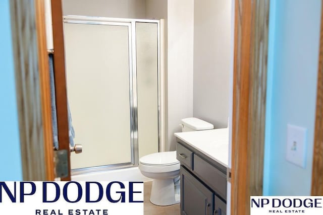611 Diamond Ln, Papillion, NE 68133 - bathroom featuring vanity, a shower stall, and toilet