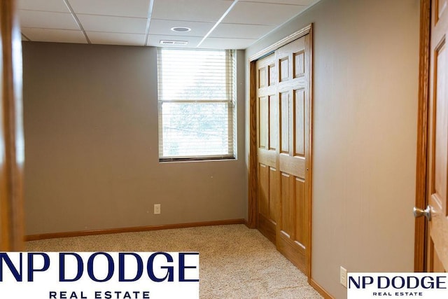 611 Diamond Ln, Papillion, NE 68133 - corridor with a paneled ceiling, carpet, and baseboards