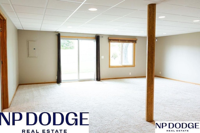 611 Diamond Ln, Papillion, NE 68133 - carpeted spare room with baseboards, a drop ceiling, recessed lighting, and electric panel