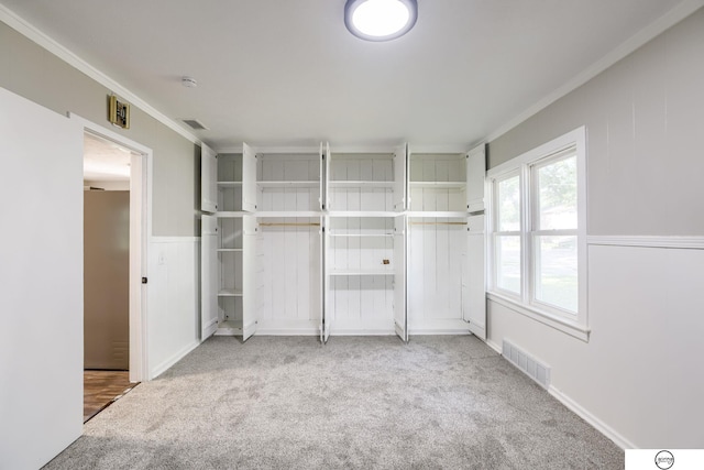 1801 Elk St, Beatrice, NE 68310 - unfurnished bedroom featuring ornamental molding and carpet flooring