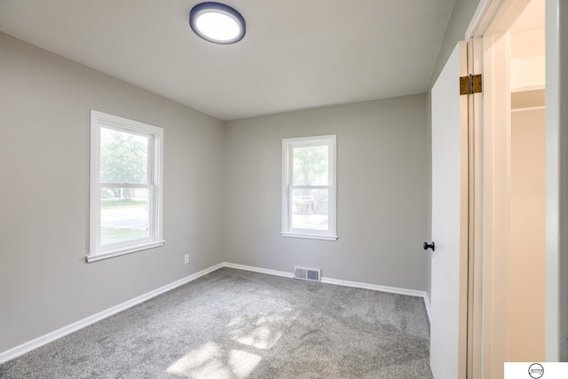 1801 Elk St, Beatrice, NE 68310 - carpeted spare room with baseboards