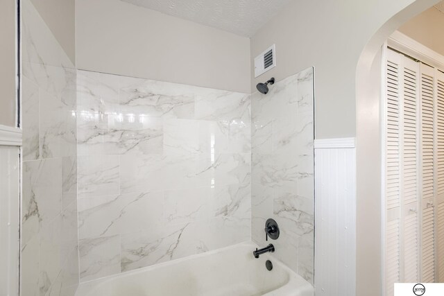 1801 Elk St, Beatrice, NE 68310 - full bath featuring  shower combination and wainscoting