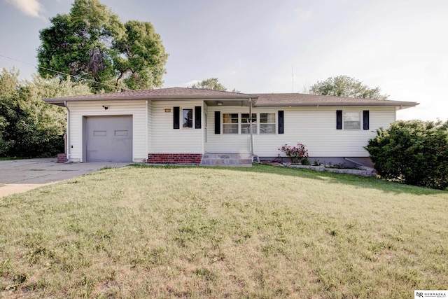 6205 Nebraska Ave, Omaha, NE 68104 - ranch-style house with a garage, concrete driveway, and a front yard