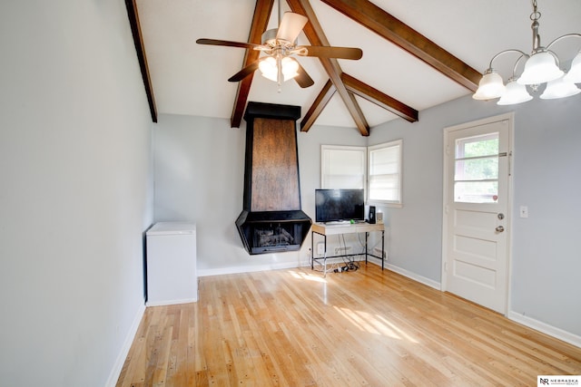 6205 Nebraska Ave, Omaha, NE 68104 - living room with a chandelier, hardwood / wood-style flooring, baseboards, and ceiling fan