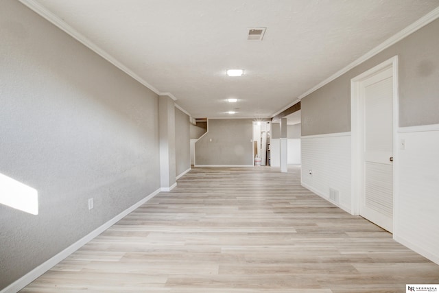 6205 Nebraska Ave, Omaha, NE 68104 - corridor with light wood-style flooring, ornamental molding, baseboards, and a textured wall