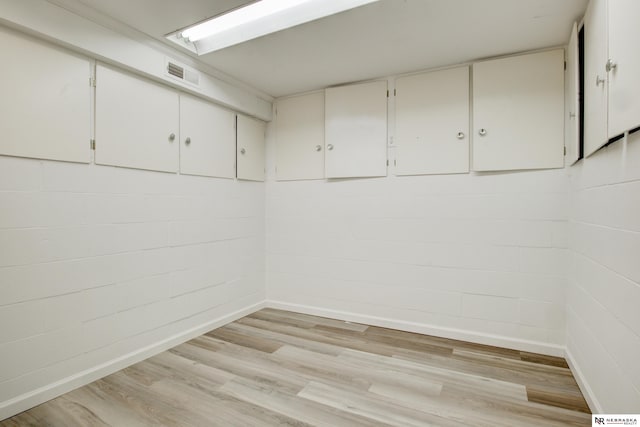 6205 Nebraska Ave, Omaha, NE 68104 - below grade area featuring light wood-style flooring and baseboards