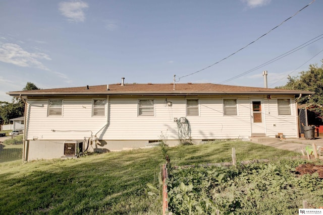 6205 Nebraska Ave, Omaha, NE 68104 - rear view of property featuring central air condition unit, crawl space, and a cooling unit