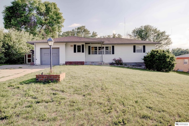 6205 Nebraska Ave, Omaha, NE 68104 - ranch-style home featuring driveway, a garage, and a front yard
