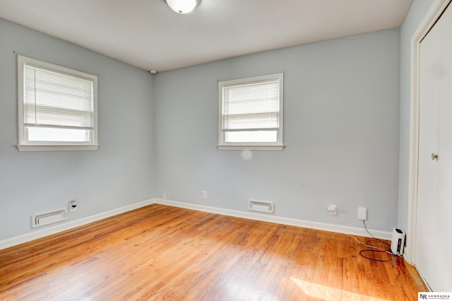 6205 Nebraska Ave, Omaha, NE 68104 - empty room featuring baseboards and wood finished floors