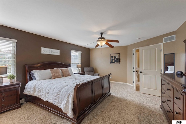 8815 N Hws Cleveland Blvd, Bennington, NE 68007 - bedroom featuring light colored carpet, baseboards, and ceiling fan