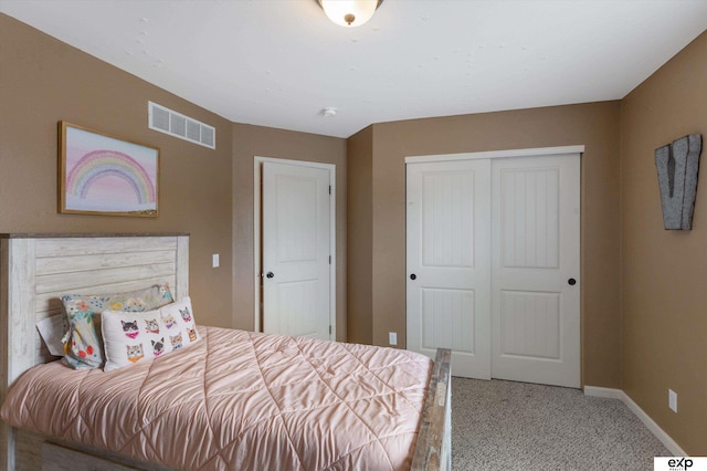 8815 N Hws Cleveland Blvd, Bennington, NE 68007 - bedroom with a closet, light carpet, and baseboards