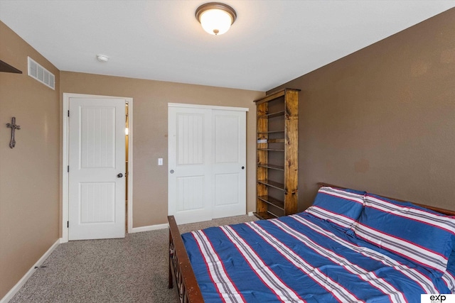 8815 N Hws Cleveland Blvd, Bennington, NE 68007 - carpeted bedroom with baseboards and a closet