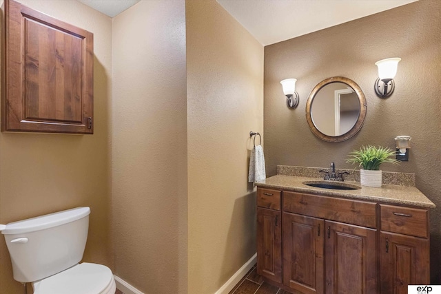 8815 N Hws Cleveland Blvd, Bennington, NE 68007 - half bath featuring toilet, vanity, and baseboards