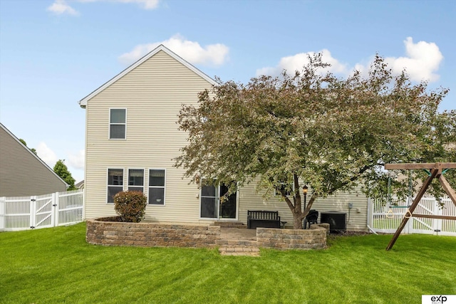 8815 N Hws Cleveland Blvd, Bennington, NE 68007 - rear view of house featuring a gate and central AC