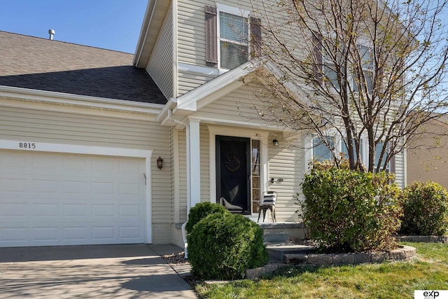 8815 N Hws Cleveland Blvd, Bennington, NE 68007 - view of front of home with roof with shingles and a garage